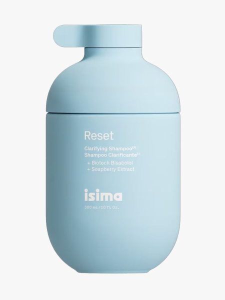 Isima Clarifying Shampoo in branded component on a light gray background